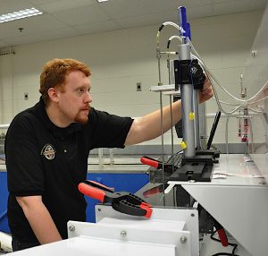 HANDS-ON EXPERIENCE Sean Kunzman carefully monitors his research in the Purdue University North Central Fluid Mechanics and Heat Transfer Lab, which allows mechanical engineering students to learn on the same equipment and materials they’ll find on the job.