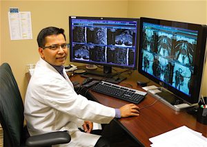 THE NEW STANDARD Dr. Vivek Mishra chairs the Department of Radiology at Porter Regional Hospital, first in the area to use magnetic resonance imaging technology to help diagnose prostate cancer.