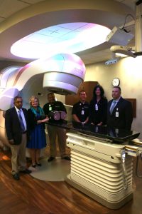 St. Mary Medical Center recently unveiled the new TrueBeam radiotherapy system to treat cancer patients. Pictured L-R: Radiation oncologist, Koppolu Sarma, MD; hospital CEO, Janice Ryba; Albert Castro, Radiation Therapist; Christpher Tien, Physicist; Biljana Terzioski, Radiation Therapist; and Pete Dyba, director of Imaging Services.