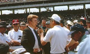 AN ENCYCLOPEDIA OF RACING A young Donald Davidson is interviewed by the late Jim Phillippe, the Speedway’s longtime public address announcer.