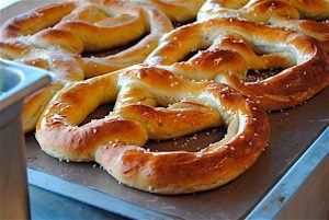 “EATING ONE OF OUR PRETZELS IS REALLY AN EMOTIONAL EXPERIENCE,” according to the founders of Ben’s Soft Pretzels, Brian Krider, Ben Miller and Scott Jones.