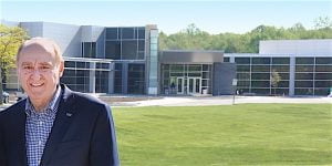 “THERE’S A SYNERGY” Jim Dworkin, retired chancellor of Purdue North Central, says a skilled workforce attracts new business investment. Still on the faculty, he is shown in front of the new James B. Dworkin Student Services and Activities Complex.