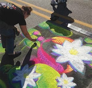 HOOKED ON ART FESTIVAL Chalk artists and others fill the streets of downtown Chesterton with color and unique creations.