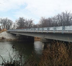 BUILDING BRIDGES Tonn and Blank Construction of Michigan City completed this span taking County Road 500 East over the Kankakee River in Porter County.