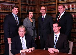 BEST LAW FIRM FOR LITIGATION: Eichhorn & Eichhorn (co-winner with Burke Costanza & Carberry). Pictured are Eichhorn attorneys who were honored as Super Lawyers or Rising Stars this year. Top row: John McCrum (Super Lawyer), Carly Brandenburg (Rising Star), Trenton Gill (Rising Star) and Logan Hughes (Rising Star); seated: David Jensen (Super Lawyer) and Louis Voelker (Super Lawyer).