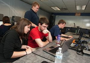 LEADING THE WAY Indiana Institute of Technology’s new honors program in leadership addresses the changing needs of the job market. Pictured are Anthony McMichael (standing), Christina Mettert, Joseph Langschwager and Nathan Whetstone.