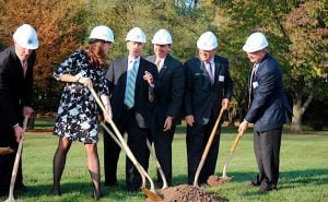“POLITICAL RISING STAR” LaPorte Mayor Blair Milo turns the dirt at a groundbreaking ceremony at Thomas Rose Industrial Park.
