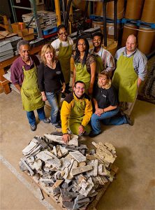 CREATING OPPORTUNITIES Julie Rizzo, founder of Recycled Granite, helped The ARC Northwest Indiana develop an onsite training program to teach special needs individuals how to recycle granite remnants.