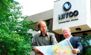 TELECOM REVOLUTION Tom Carroll, senior vice president of sales and marketing, and Tom Long, president, are part of the growth story at Nitco in Hebron, established in the 1890s.