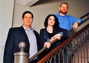 ARTSPACE UPTOWN ARTIST LOFTS Property manager Catherine MacDonald, pictured with Michigan City controller Rich Murphy and planning director Craig Phillips.