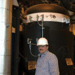Norm Fischer chief engineer of The Fischer Group. Norm designed a new high-tech way to remove humidity and contaminants from the air, a necessity for industrial manufacturing.
